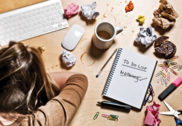 woman-sleeping-on-desk